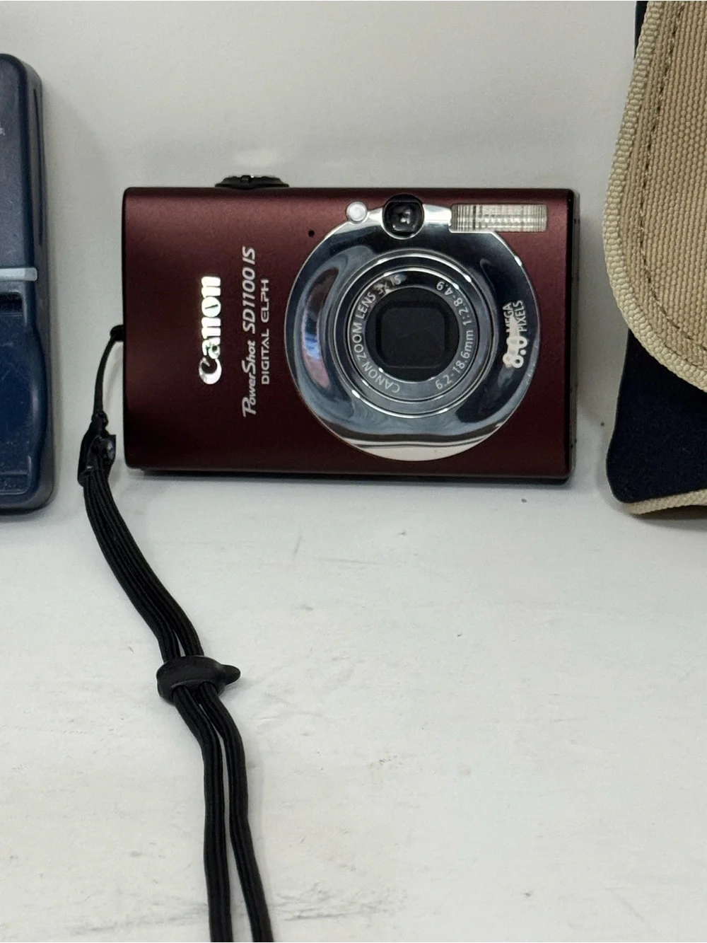 Canon Digital Camera with Charger and Tan Carry Case - Red Camera